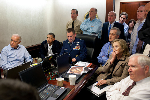 President Barack Obama and Vice President Joe Biden, along with members of the national security team, receive an update on the mission against Osama bin Laden in the Situation Room of the White House, May 1, 2011