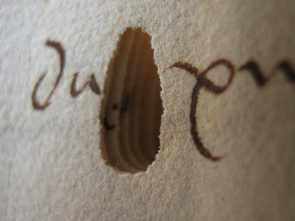 A hole made by a worm in a 15th century manuscript from the Dubrovnik archives, via @EmirOFilipovic
